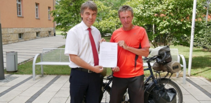 Weltumradler als Teilzeit-Briefträger