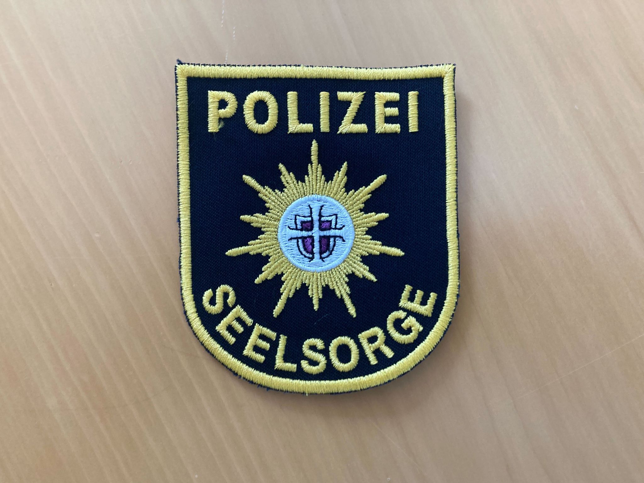 Polizeiseelsorger haben ein eigenes Emblem.