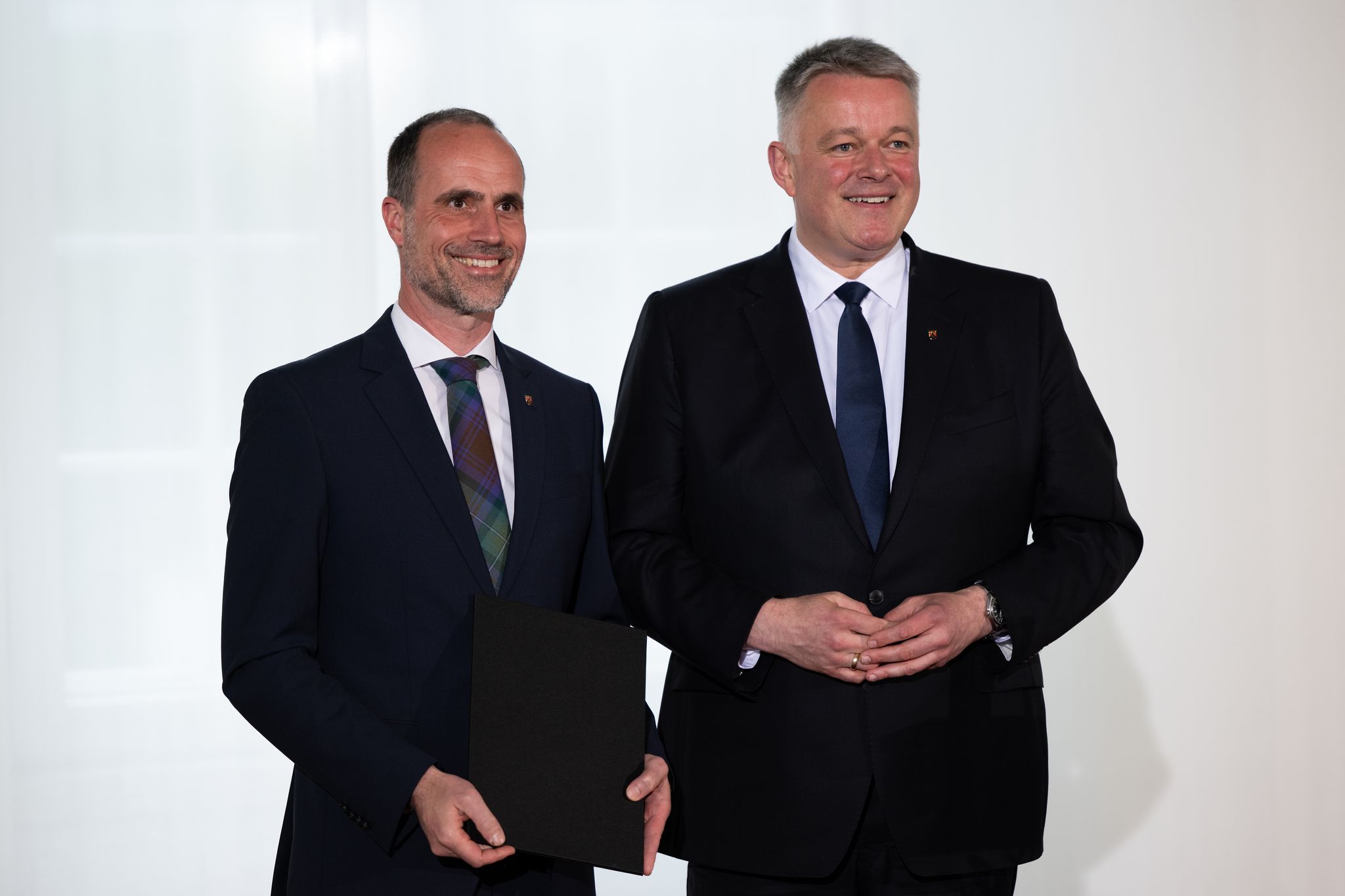 Ministerpräsident Schnieder und Wissenschaftsminister Hoch loben den Exzellenz-Titel. (Archivbild)